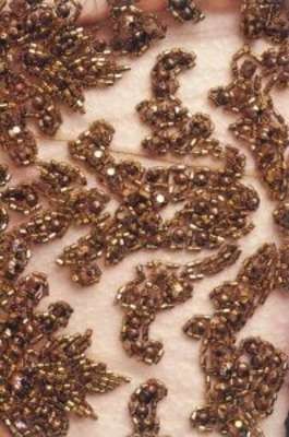 CONFIGURAÇÃO BORDADA APLICADA EM TECIDO