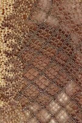 CONFIGURAÇÃO BORDADA APLICADA EM TECIDO